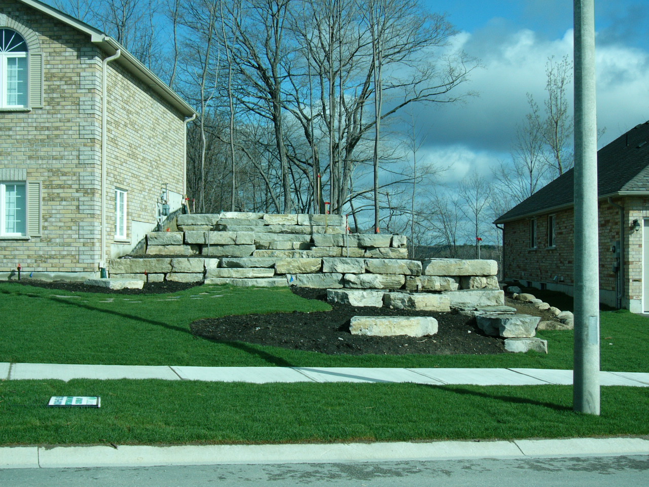 Buff Gray Armour Stone installation